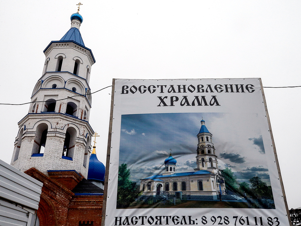 Former homeless restoring old church near Rostov