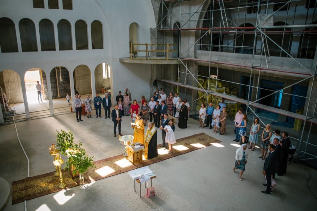 Inaugural baptism at under-construction Orthodox Cathedral in Warsaw