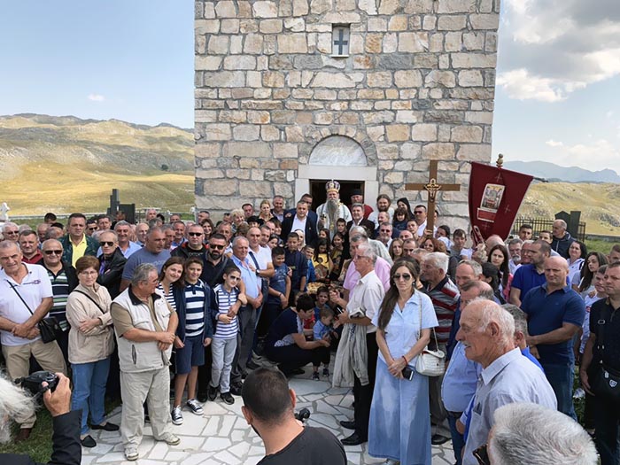 Assembly near renovated church of Saint Stephen in Katunac