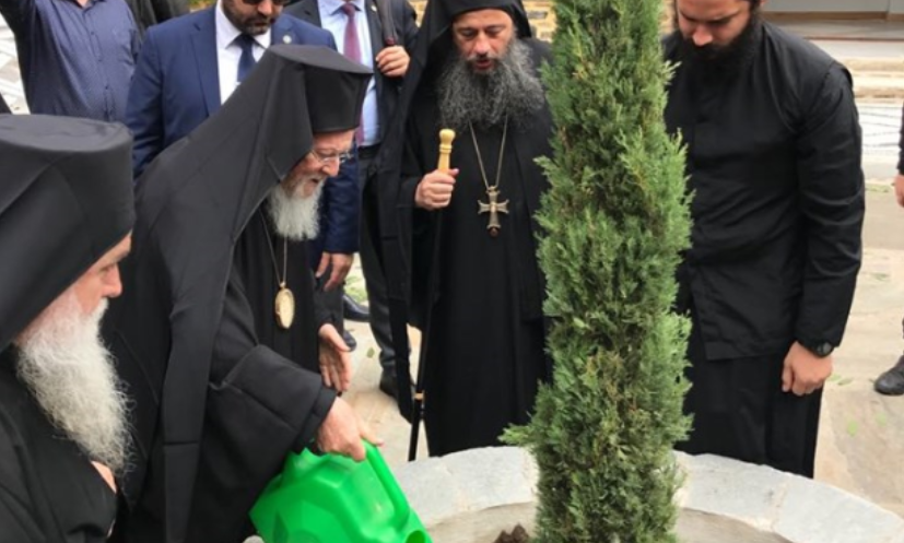 Ecumenical Patriarch plants cypress tree in Vatopedi’s courtyard in commemoration of historic 2019 visit