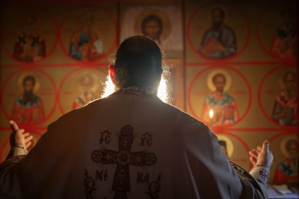 Saint Nektarios giving birth to a baby