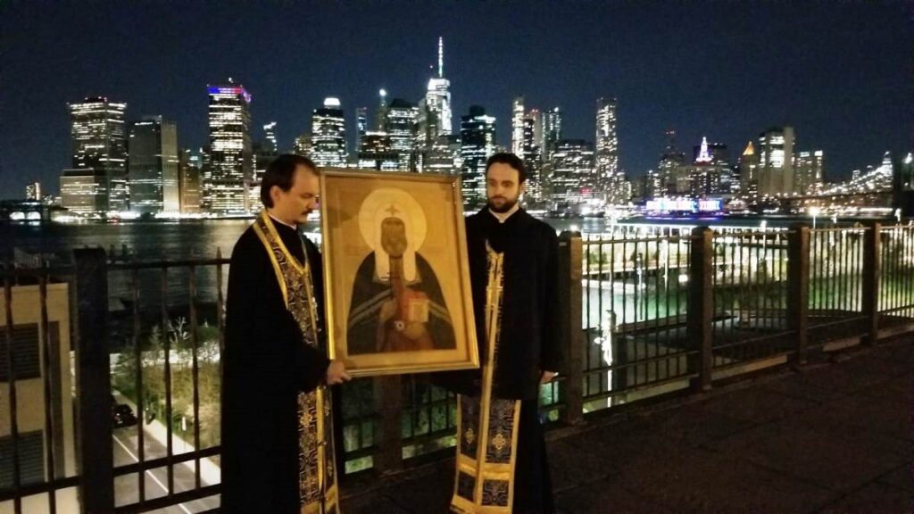 Clergy of St. Nicholas Patriarchal Cathedral in New York drive through all the city districts in car procession with the cross