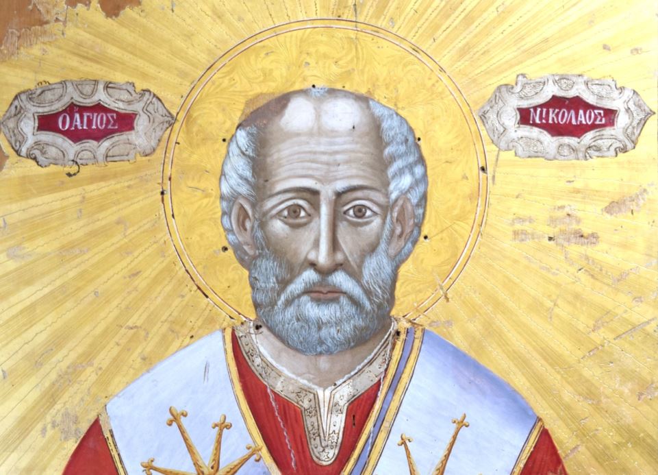 Ikona “Shën Nikolla” ka qenë pjesë e regjistrit të poshtëm të ikonostasit të kishës “Ipapandia” në Progër të Korçës dhe është pikturuar nga A.N.Ballamaçi rreth vitit 1884