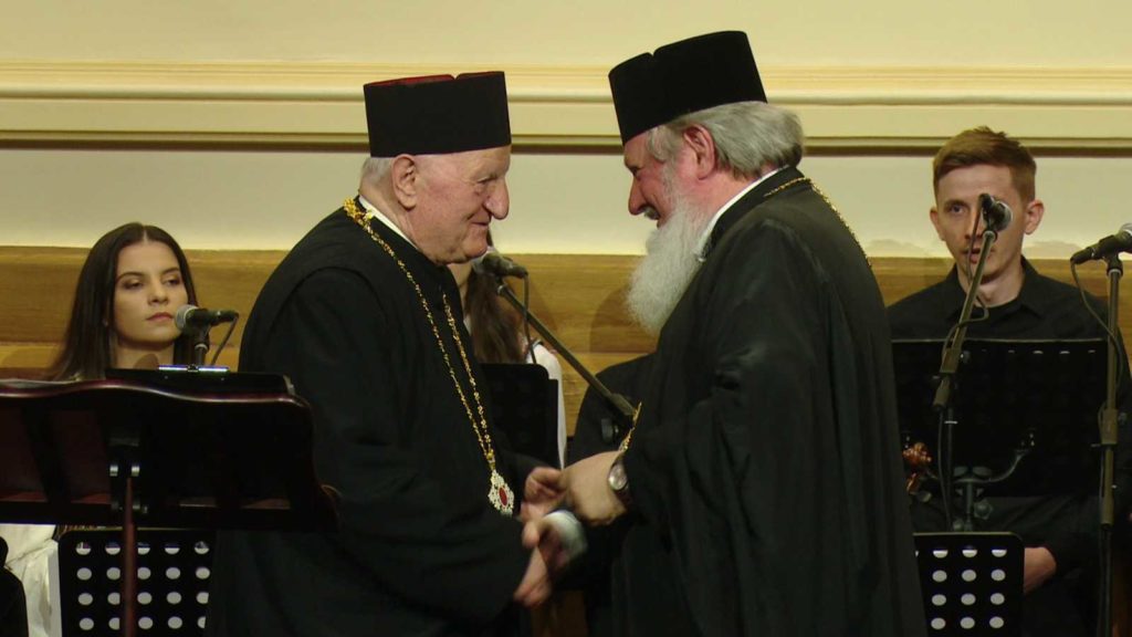 Părintele cântecelor patriotice din România a primit Crucea Patriarhală