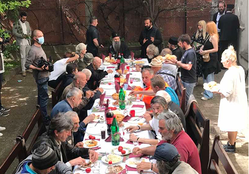 Patriarch Porfirije with the homeless and sick children