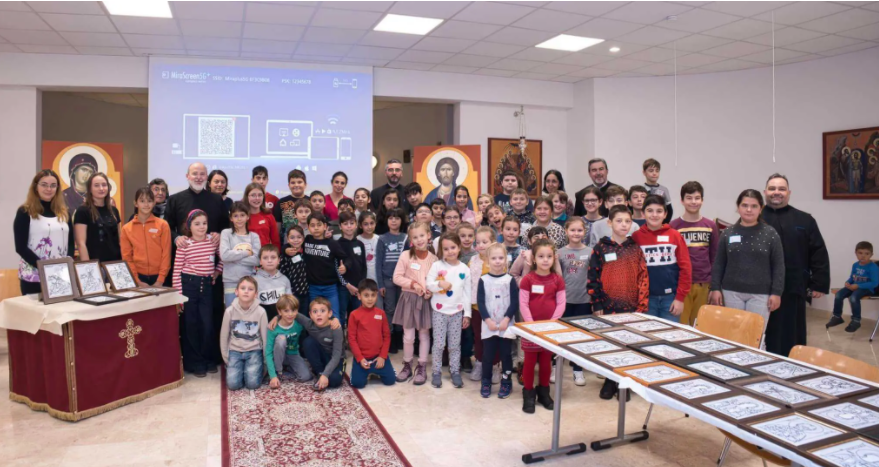 Biserica Sf. Ștefan cel Mare din Viena: Copiii pictează icoane pe sticlă îndrumați de părintele iconar Răzvan Gască