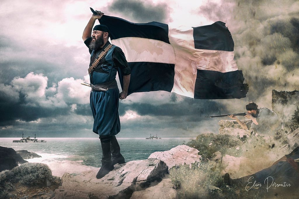 Σαν σήμερα ο Σπύρος Καγιαλές ανυψώνει με το σώμα του την Ελληνική σημαία