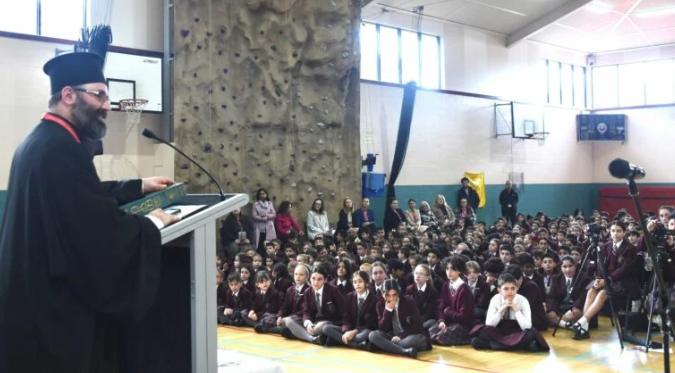 Oakleigh Grammar farewells Father George with song and dance Father Stavros will take over the as school Chaplain and as Parish Priest