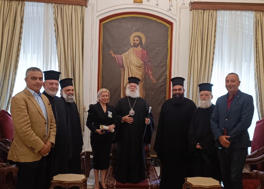 Patriarch of Alexandria Theodoros II decorates outgoing consul general of Greece in Cairo