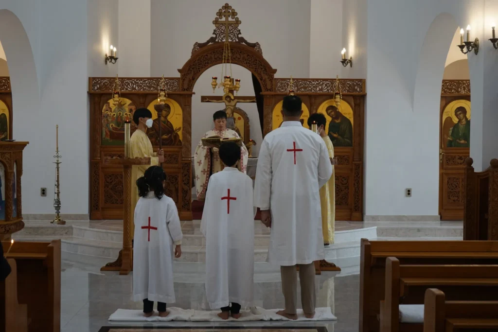 The sacrament of baptism in the Dormition of the Theotokos Church, Jeonju