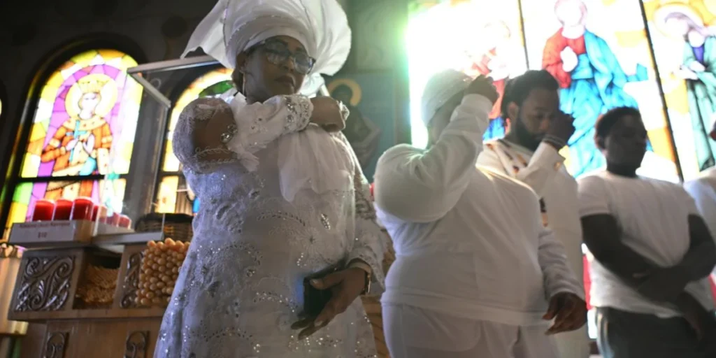 Archbishop Elpidophoros Performs Baptisms and Chrismations at Sts. Catherine & George Greek Orthodox Church in Astoria, NY