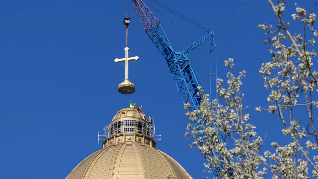 Seven-tonne cross installed atop Romania’s National Cathedral: A top engineering moment