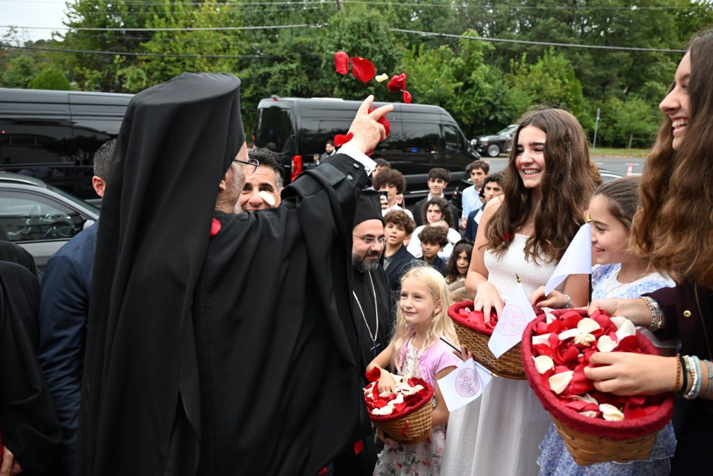 Bearing flowers and flags, St. Katherine Church welcomes Ecumenical Patriarch
