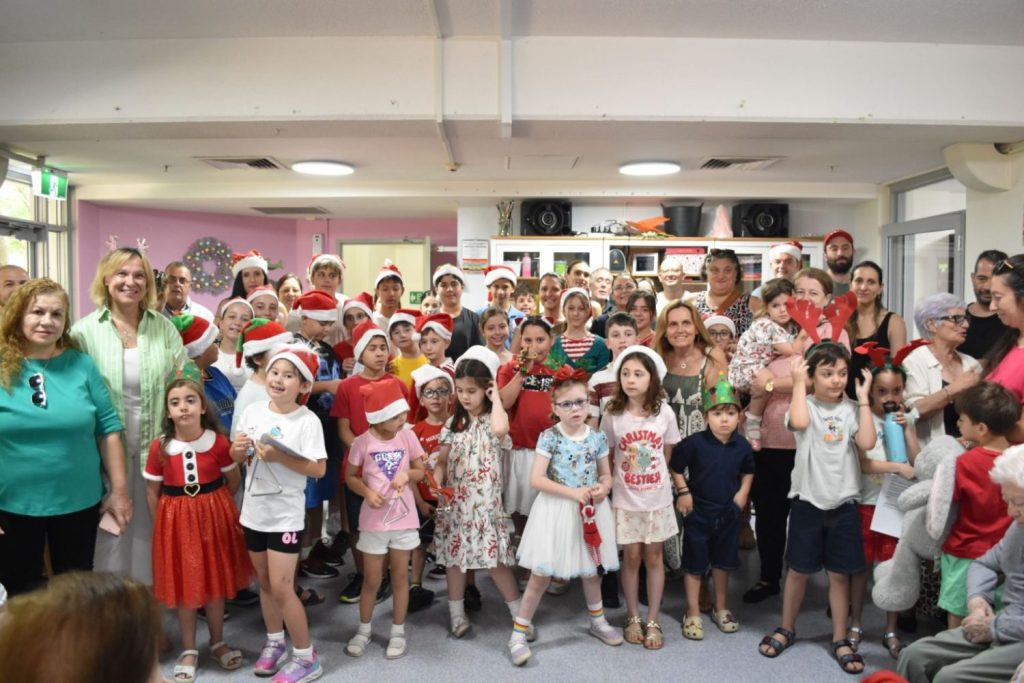 GOC NSW: Students from the Greek Schools Clemton Park, Bring Christmas Cheer to Earlwood Aged-Care Residents with Greek Carols