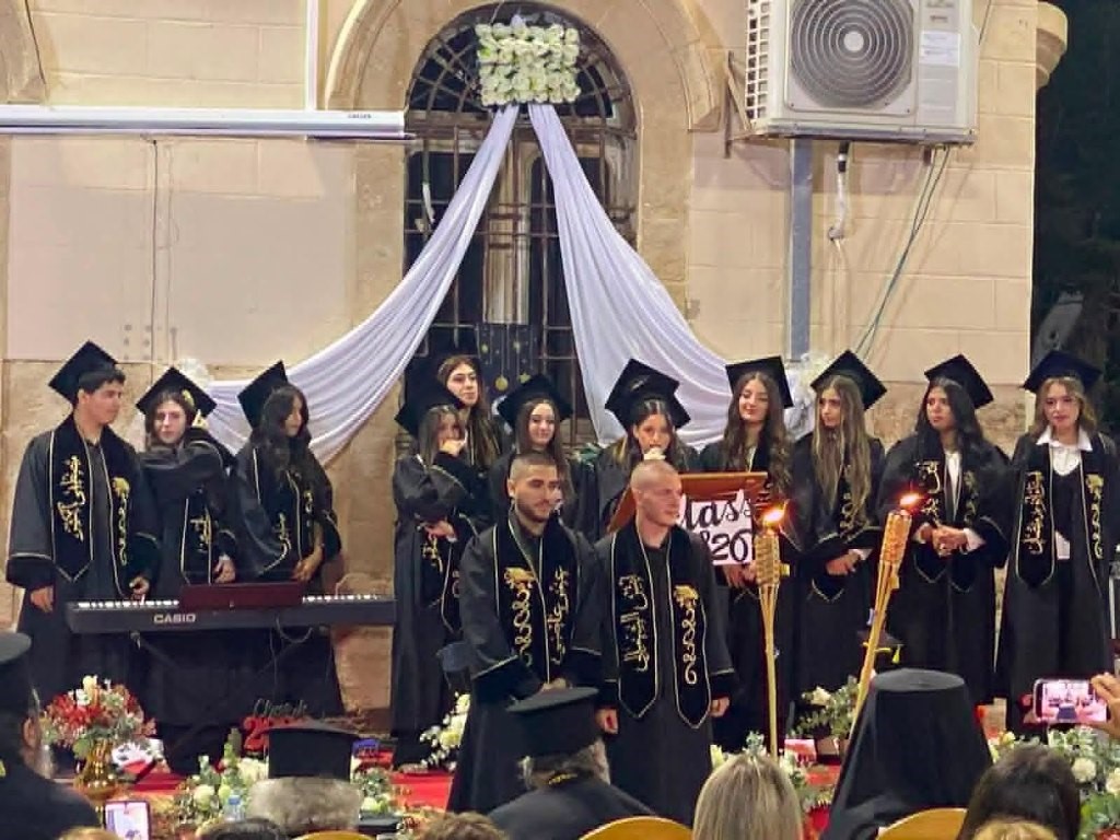 His Beatitude the Patriarch of Jerusalem presents certificate to the graduates of the Patriarchate  School in Jaffa